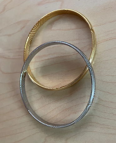 Polished Sikh Kara made of steel, symbolizing strength and connection to Sikh teachings.