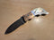 Auto-folding knife