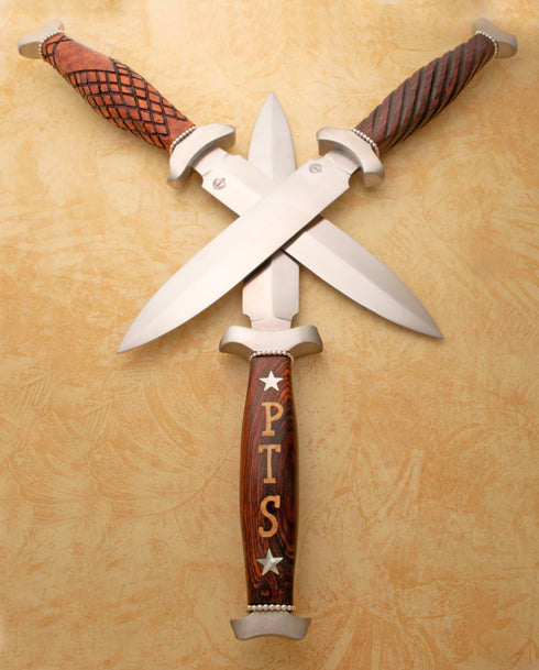 3 wooden handled daggers