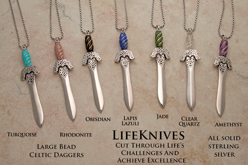 Large Celtic style gemstone handled dagger pendants