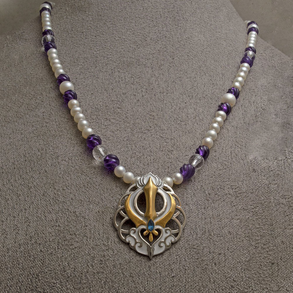 Chakra lotus Adi Shakti two-tone steel pendant on freshwater pearl, carved amethyst and faceted clear quartz bead necklace
