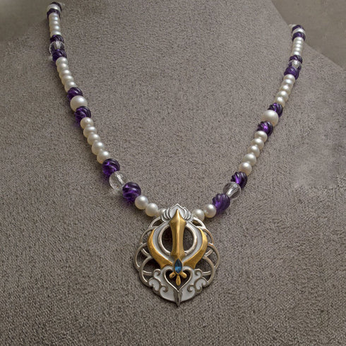 Chakra lotus Adi Shakti two-tone steel pendant on freshwater pearl, carved amethyst and faceted clear quartz bead necklace