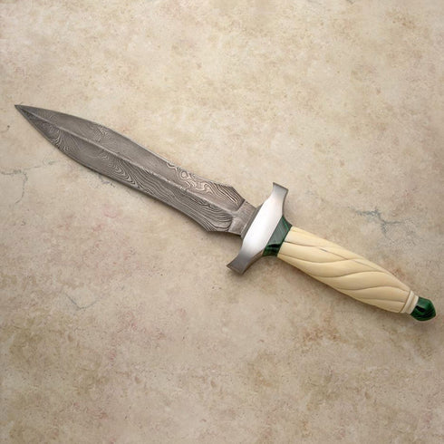 Carved fluted ivory dagger with malachite accents