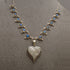 Heart shaped silver mother of pearl pendant on silver labradorite necklace