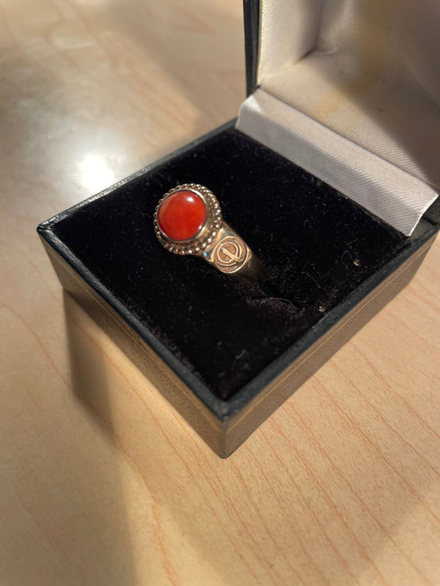 Solid gold and oxblood coral ring with Khanda / Adi Shakti symbols