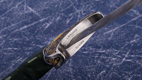 Engraved/gold inlaid jade handled dagger