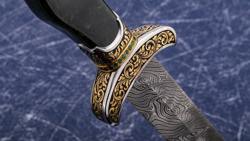 Engraved/gold inlaid jade handled dagger