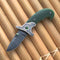 Engraved jade folding knife