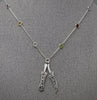 Khanda and Kirpan on faceted gemstone necklace