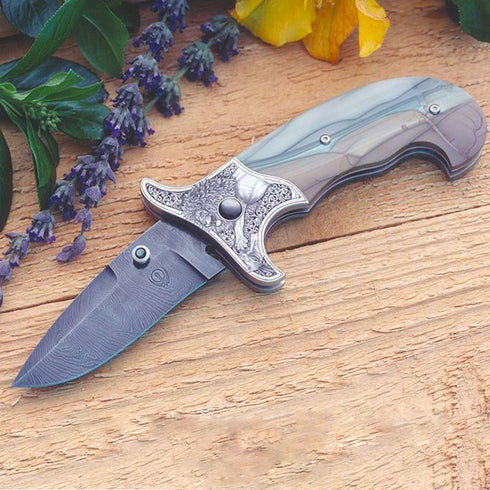Engraved imperial green jasper folding knife