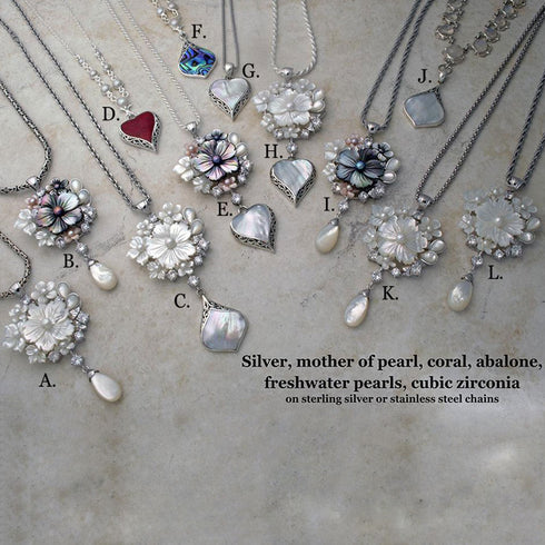 Carved mother of pearl and freshwater pearl necklaces