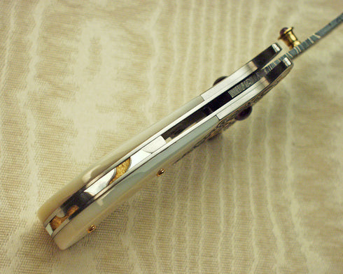 Mother of pearl handled, engraved liner lock folding Kirpan