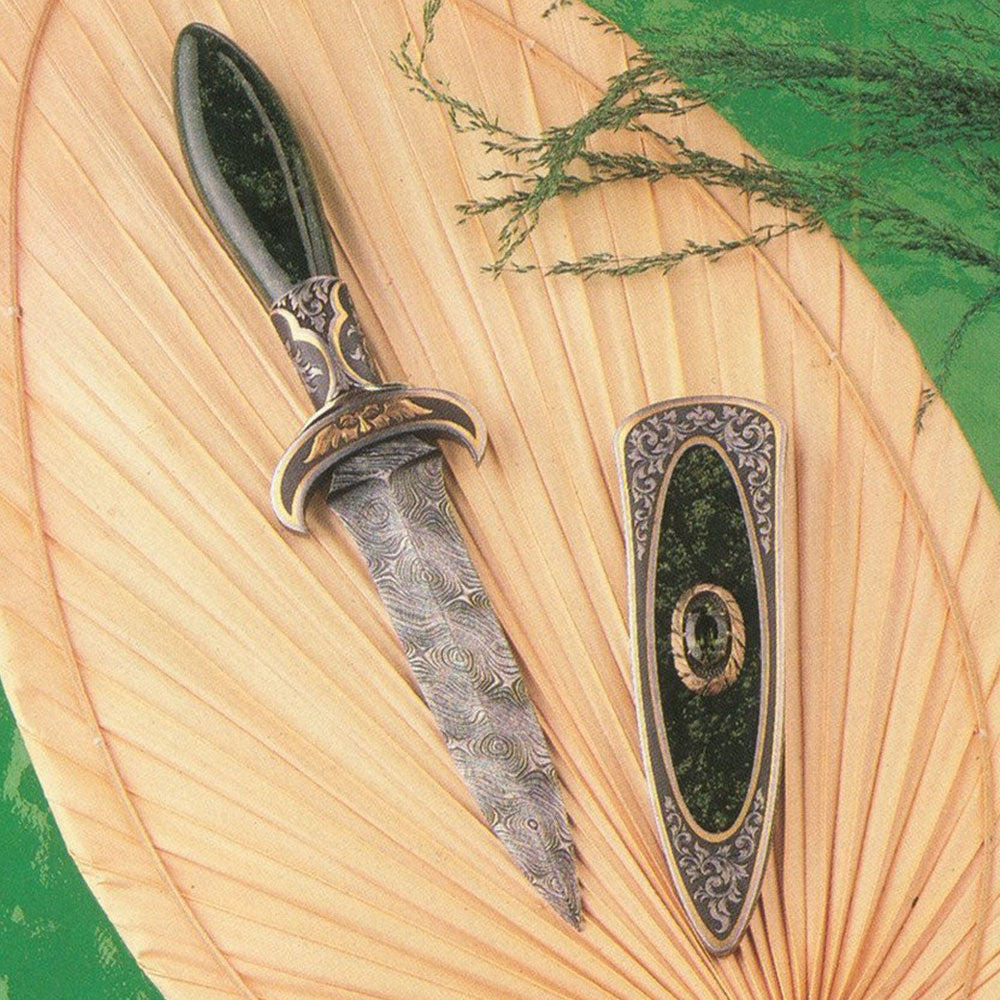 Engraved jade handled boot knife and matching scabbard