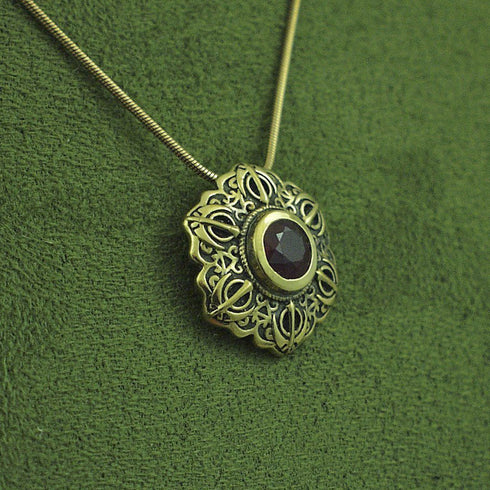 Ruby and gold khanda / adi shakti Talisman pendant