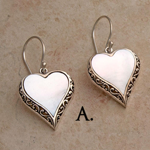 Heart shaped silver mother of pearl pendant on silver labradorite necklace