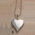 Heart shaped silver mother of pearl pendant on silver labradorite necklace