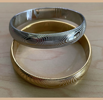 Medium size rust-proof stainless Damascus steel kara bracelets with a durable gold-tone option