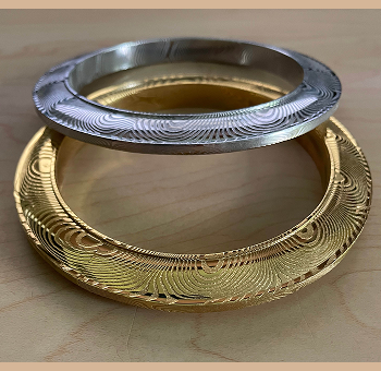 Heavyweight rust-proof stainless Damascus steel kara bracelets with a durable gold-tone option.