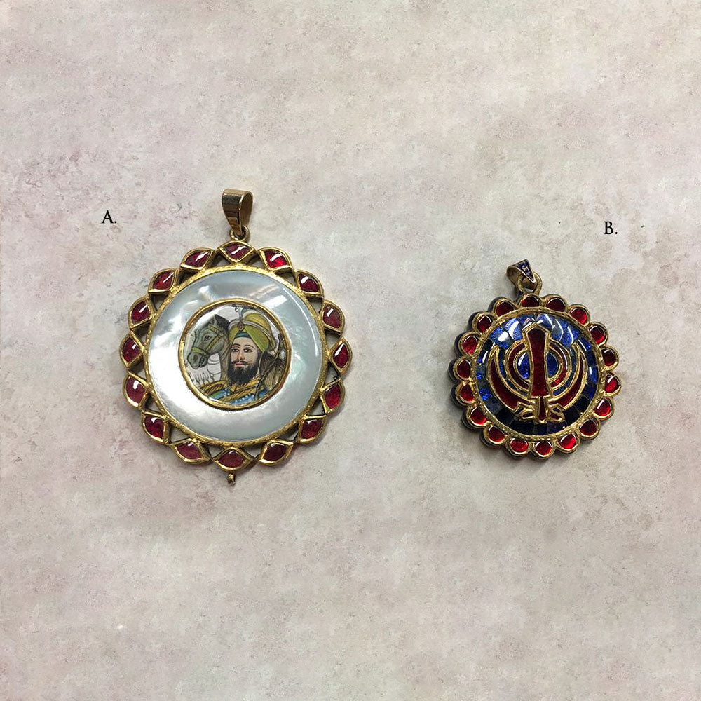 22kt. Gold Younger Guru Gobind Singh pendant and 22Kt. Gold Blue Sapphire and Ruby pendant
