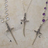 Medium size dagger pendants on gemstone and hearts necklaces