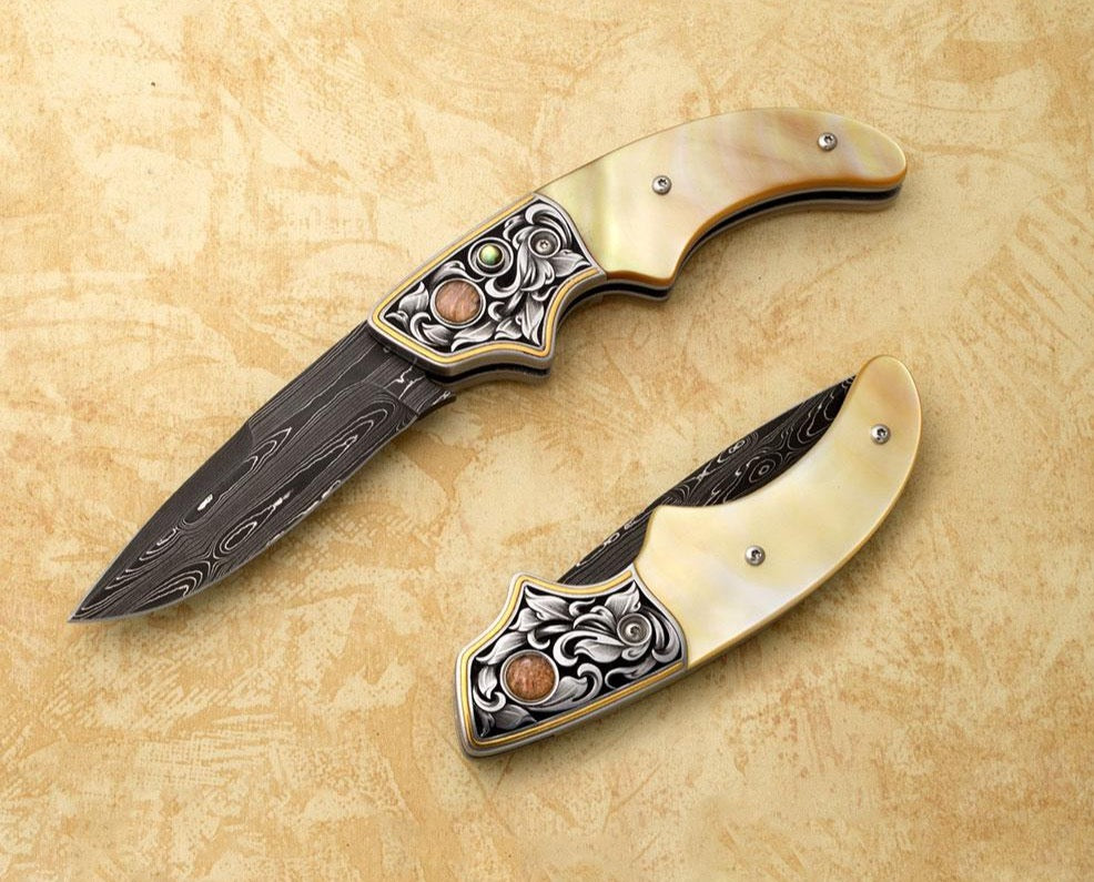 Gold mother of pearl, engraved auto-folding knife