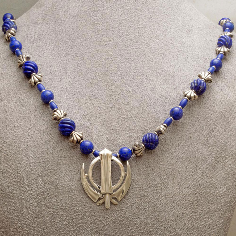 Carved gem grade lapis lazuli and silver bead necklace with Khanda pendant