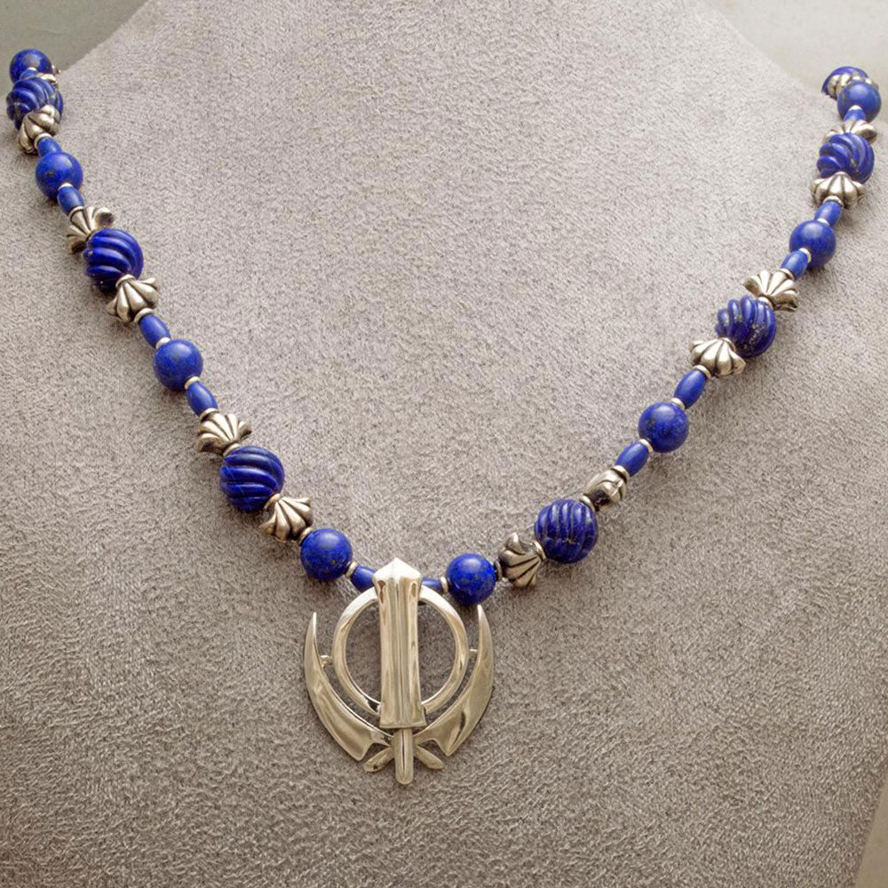 Carved gem grade lapis lazuli and silver bead necklace with khanda / adi shakti pendant