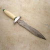 Carved fluted ivory dagger with malachite accents