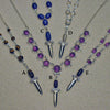 Mini gemstone and pearl handled dagger pendants with matching necklaces