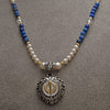 Two-tone steel heart Khanda/Adi Shakti pendant on freshwater pearl, lapis lazuli and carved clear quartz bead necklace