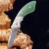 Engraved jade folding knife