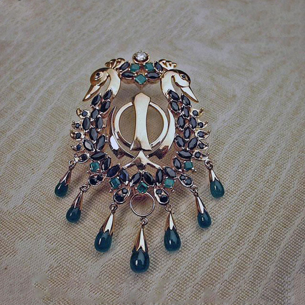 Gold Khanda swan pin pendant with Blue Sapphire and Emerald