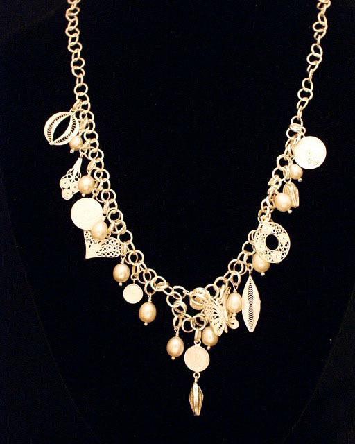 Pearl and charm necklace