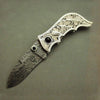 Engraved carved silver folding knife